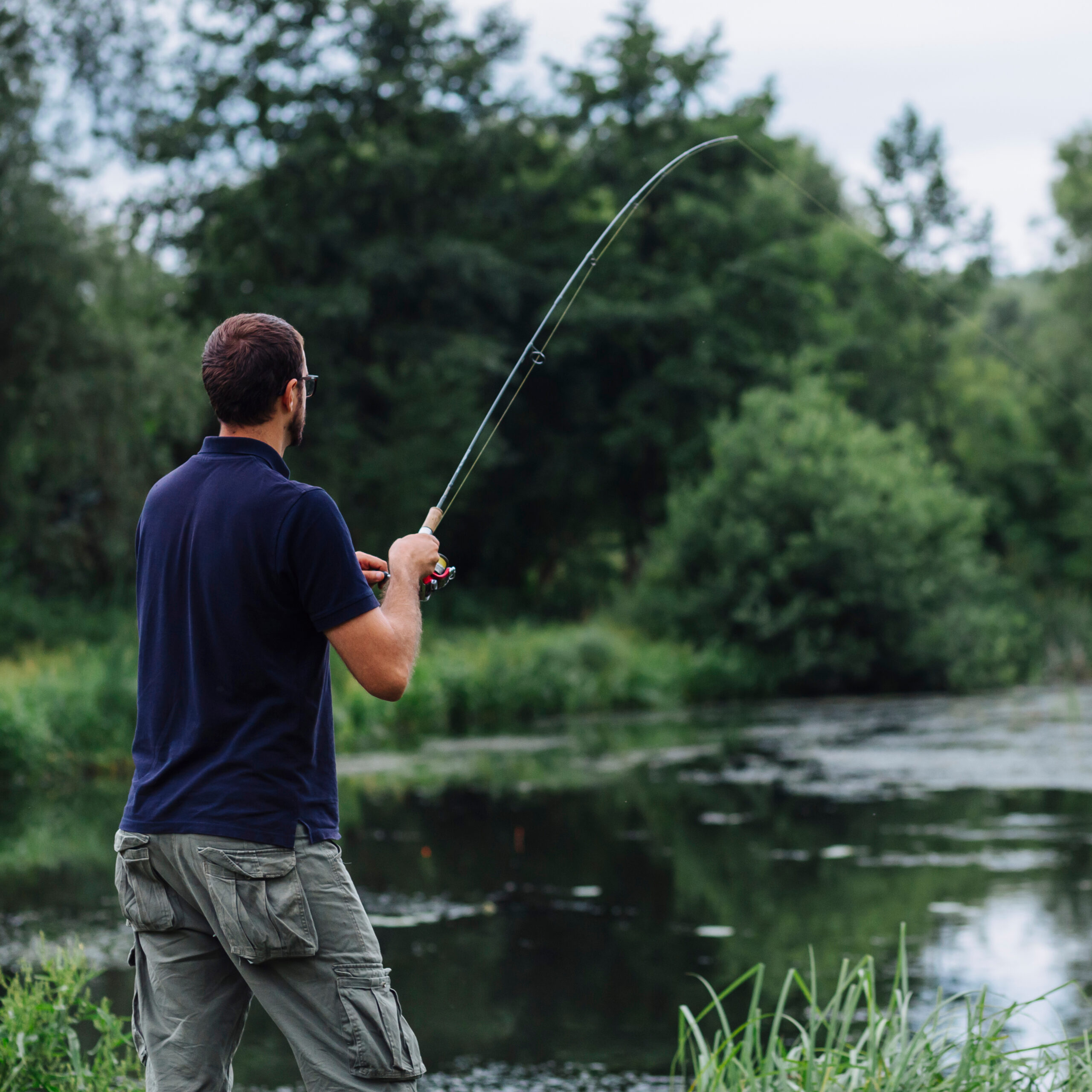 close-up-man-fishing-lake close-up-man-fishing-lake